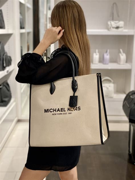 mirella michael kors|Michael Kors large canvas tote.